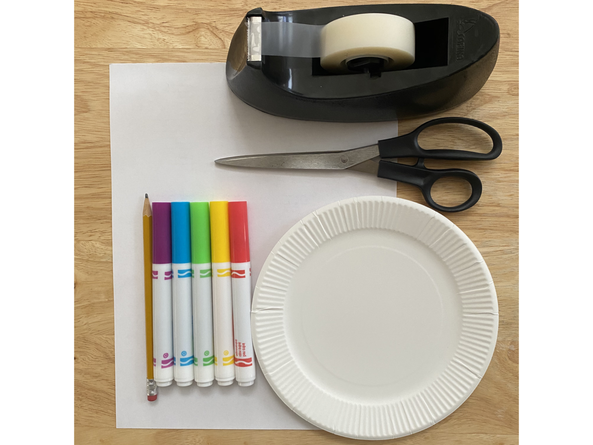 Detailed step for making a puppy out of a paper plate.