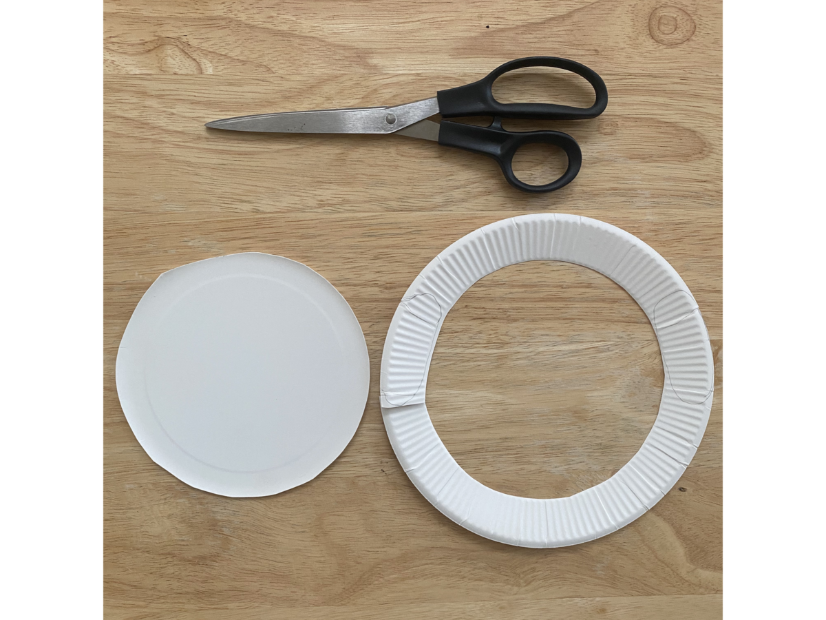 Detailed step for making a puppy out of a paper plate.